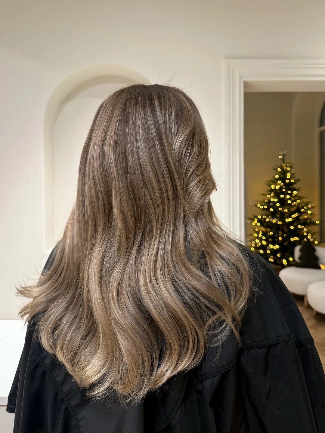 Shoulder length taupe brown hair with beige ribbons