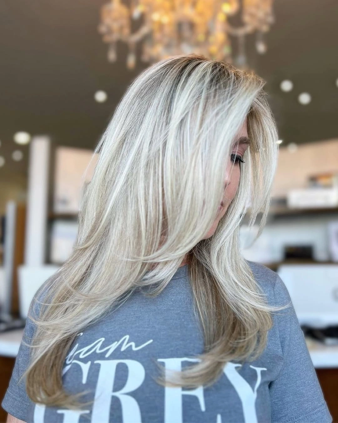 Long pale blonde hair with cool beige layers