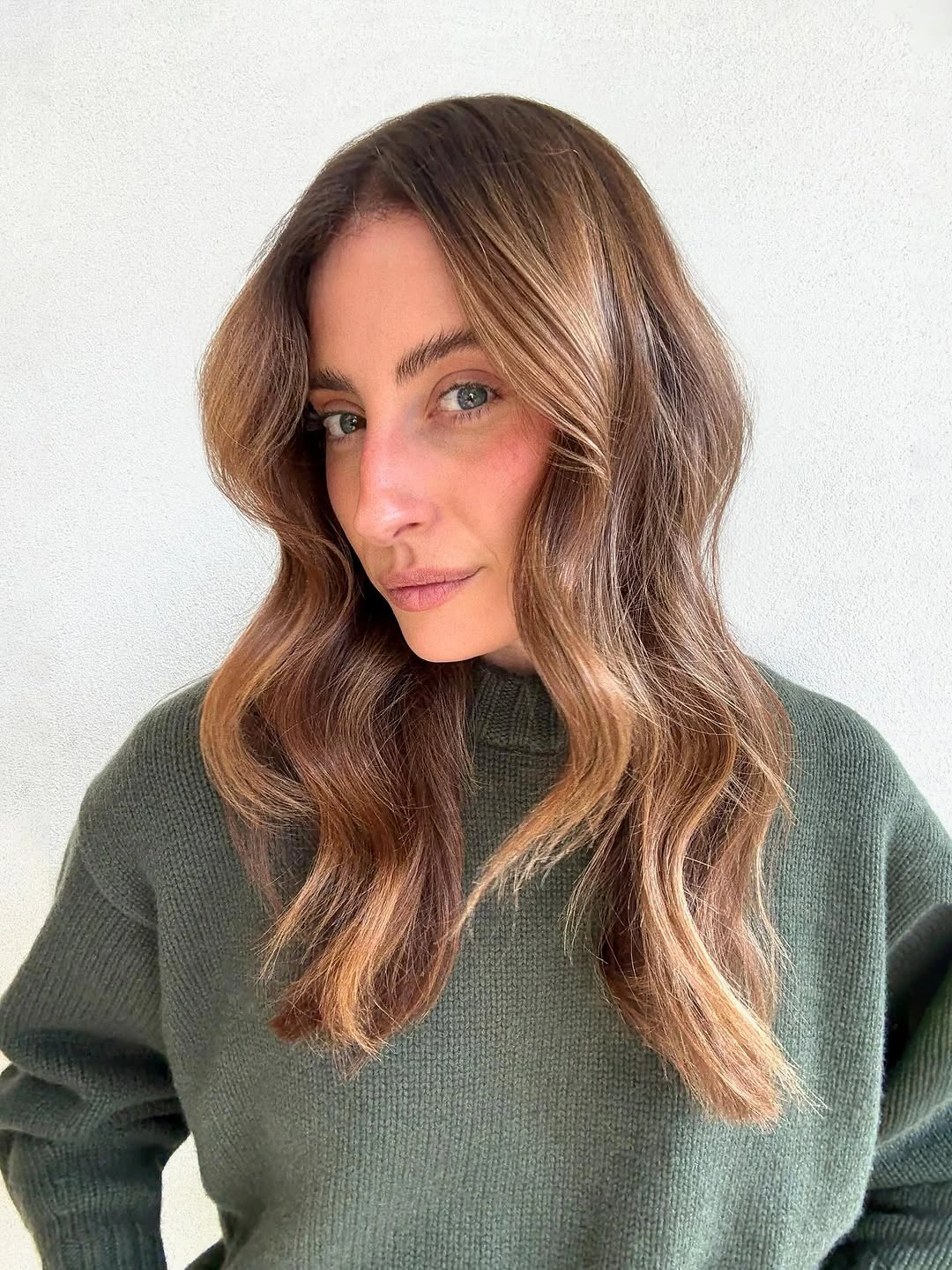 Chestnut brown waves with caramel face framing ribbons