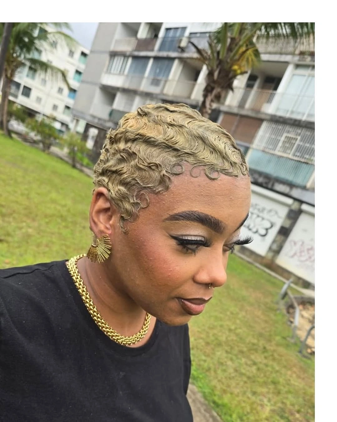 Short pale blonde crop with sculpted wave pattern