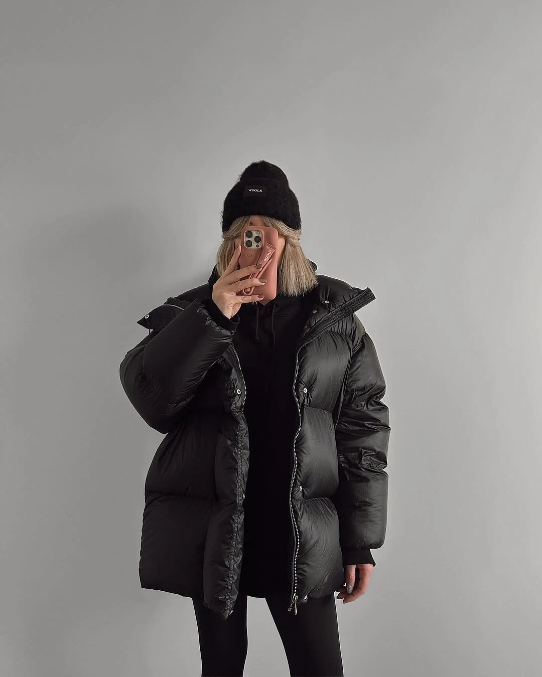 Glossy black puffer beanie and slim black lower half
