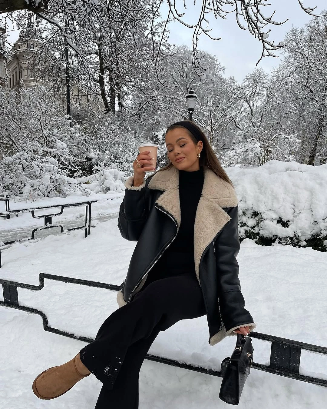 Black cream-trim jacket black base and tan ankle boots