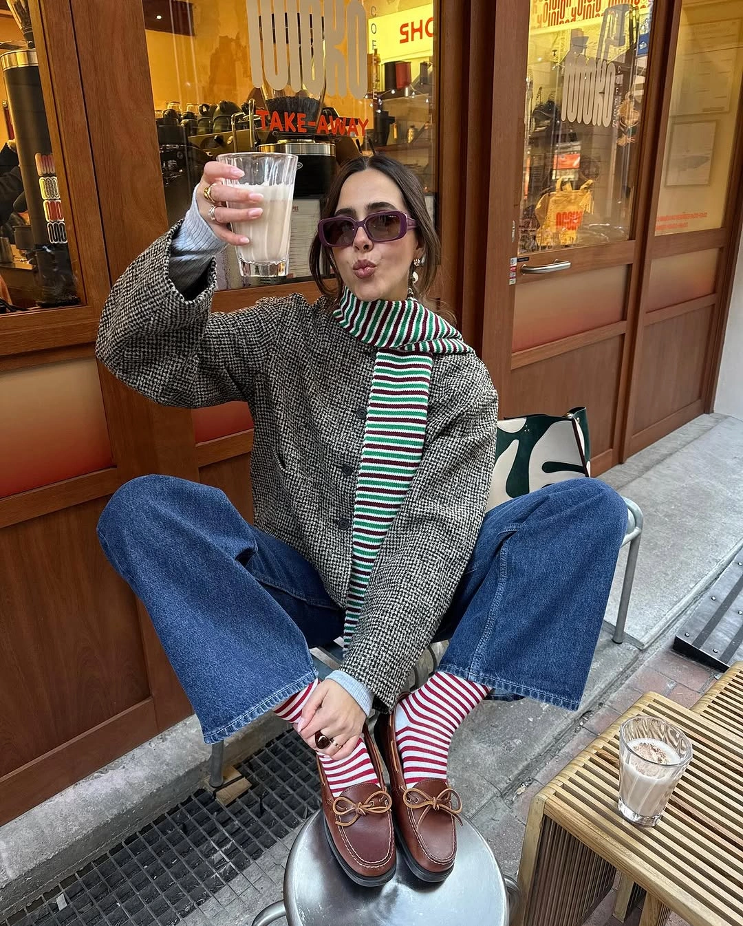 Check jacket striped scarf cuffed jeans socks and loafers