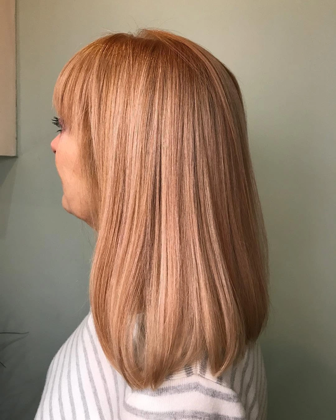 Medium copper-peach hair with smooth rounded ends