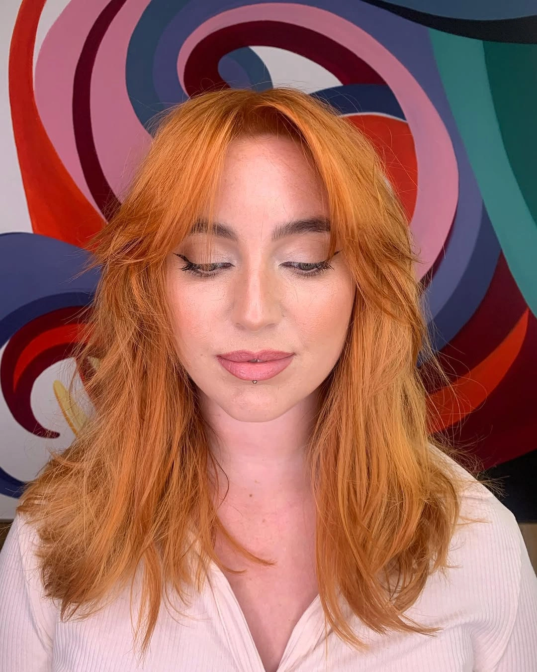 Medium copper shag with parted face-framing layers