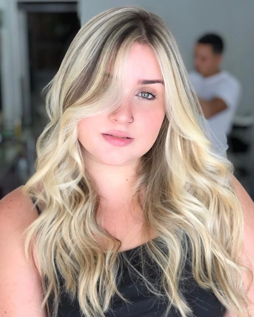 Long blonde highlighted waves with lighter front pieces