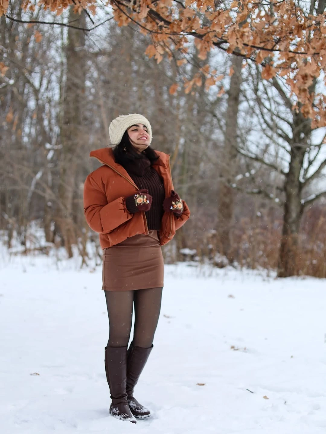Oversized gray blazer, long gray skirt, burgundy bag and hosiery