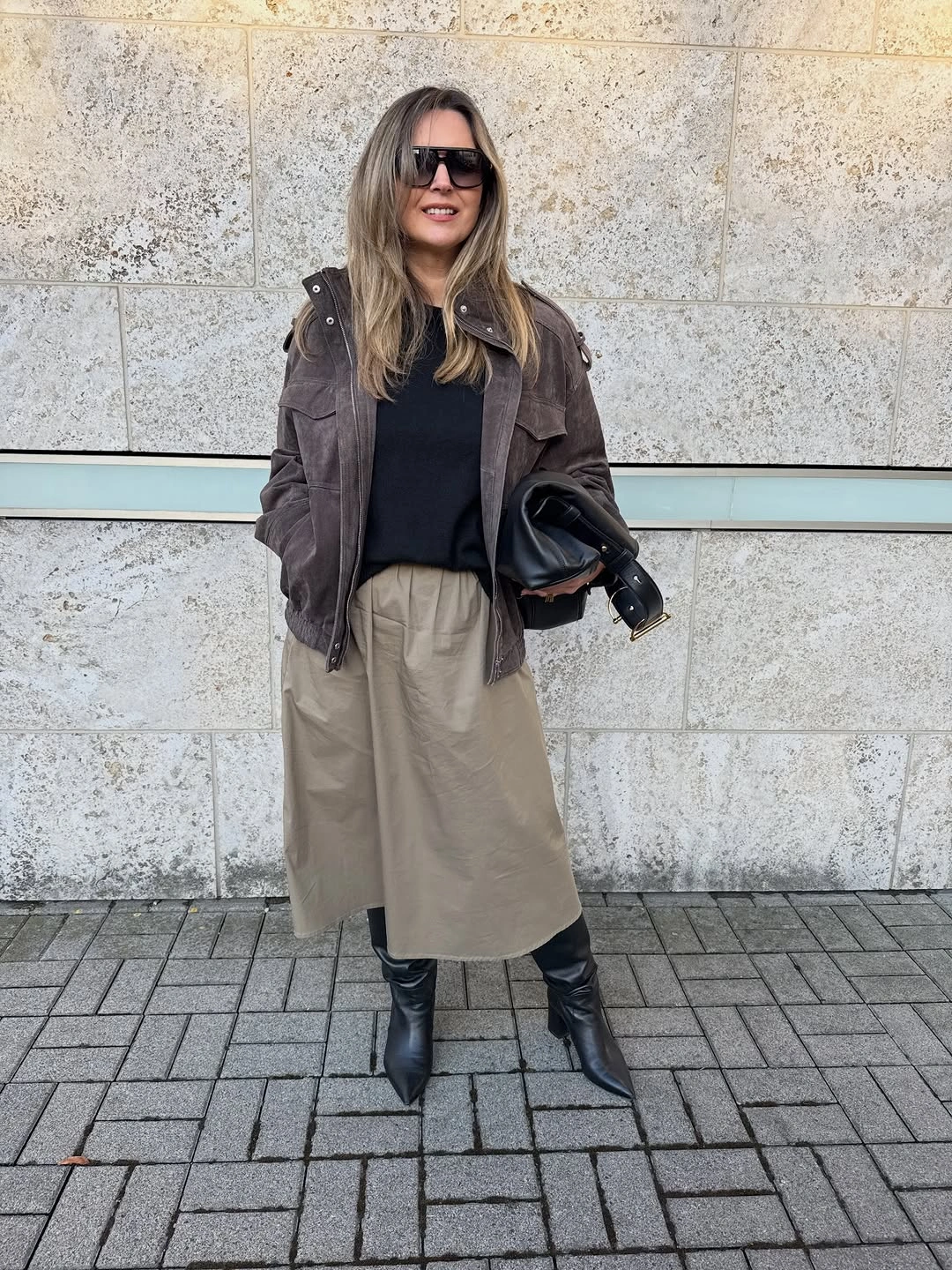 Pale blue knit with belted plaid mini, tights and tall boots